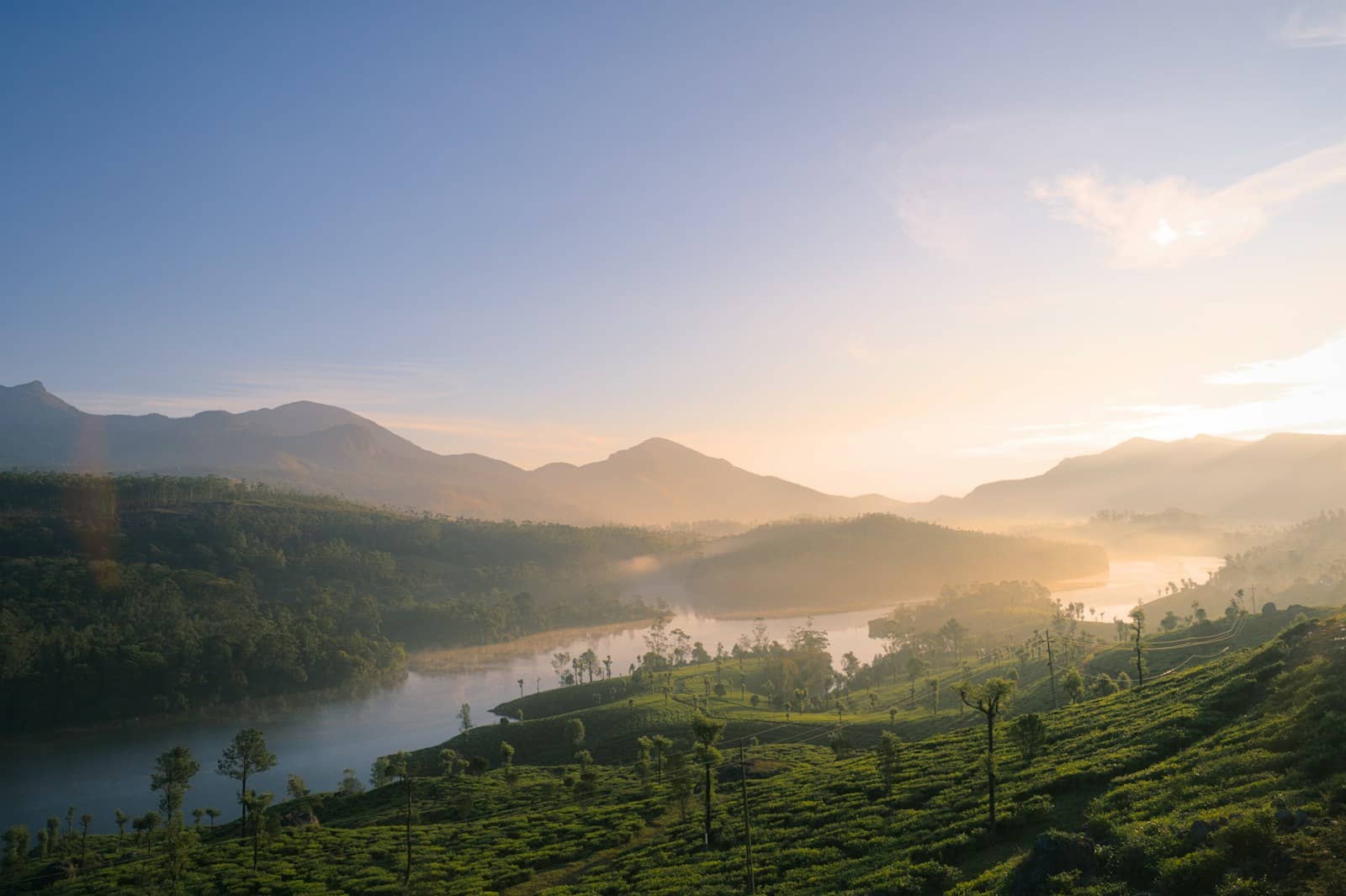Sunrise over misty hills