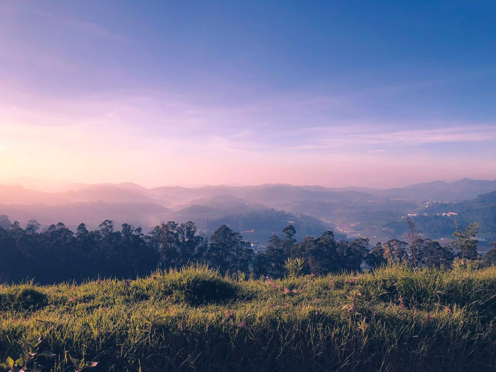 Sunrise clouds over a hill station