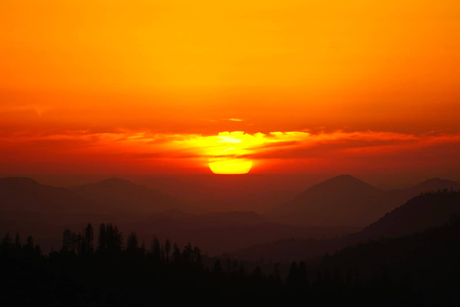 Silhouetted hills at sunset