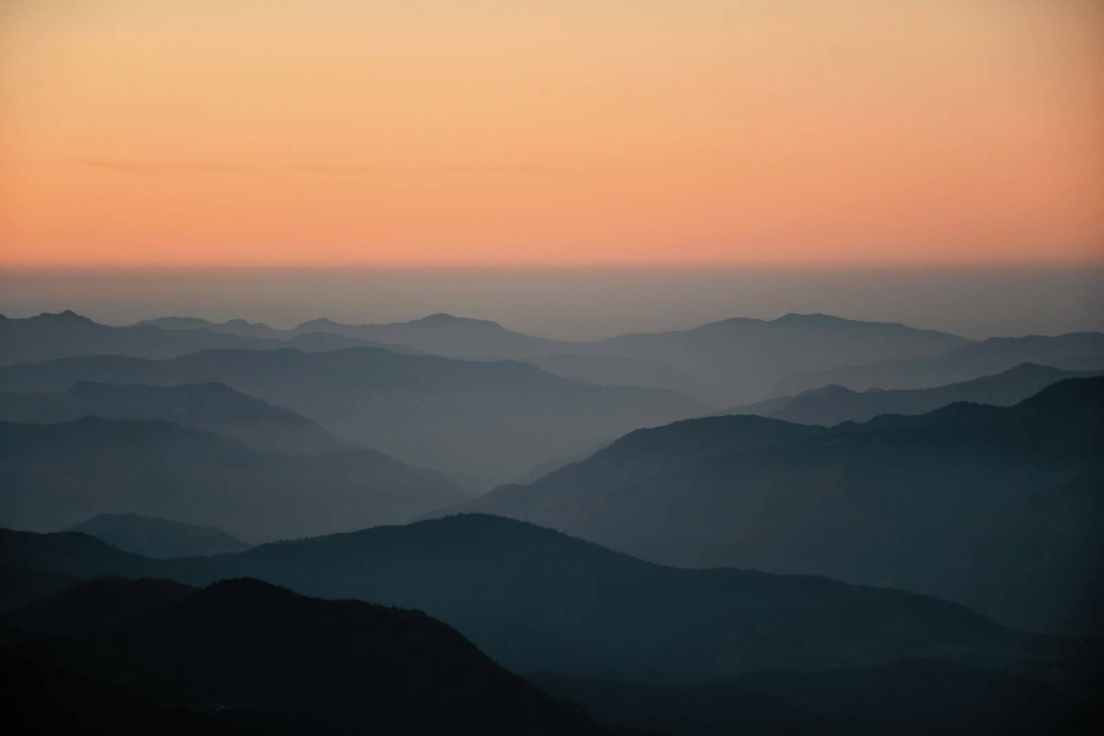 Silhouetted mountains at sunset