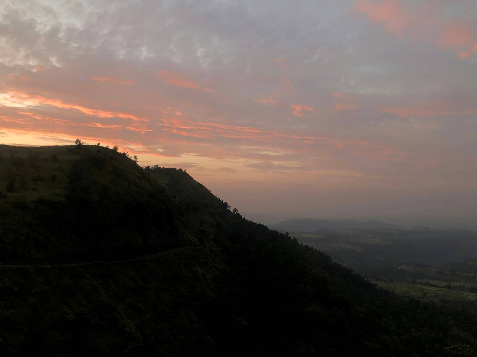 A road trip through the hills at sunset